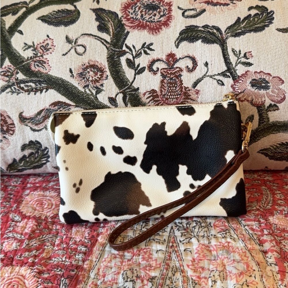 Cow-Print Wristlet Clutch in Black and White with Brown Strap